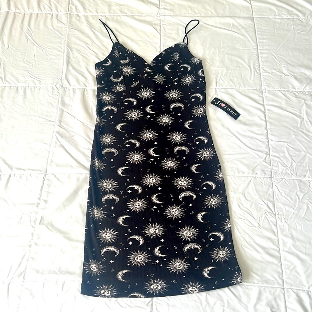 Cute celestial black and white dress. Super soft and super stretchy. Never worn